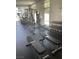Well-equipped gym featuring weight machines, dumbbells, and benches for a comprehensive fitness experience at 8925 W Flamingo Rd # 105, Las Vegas, NV 89147