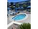 Inviting hot tub with lounge chairs and shade, offering a relaxing outdoor retreat for residents at 8925 W Flamingo Rd # 105, Las Vegas, NV 89147