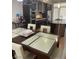 Modern kitchen featuring granite countertops, stainless steel appliances and breakfast bar seating at 8925 W Flamingo Rd # 105, Las Vegas, NV 89147