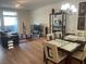 Bright living room with modern furnishings, balcony access, and dining area at 8925 W Flamingo Rd # 105, Las Vegas, NV 89147