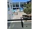 Apartment balcony view of the pool area featuring cabanas and lounge chairs at 8925 W Flamingo Rd # 105, Las Vegas, NV 89147