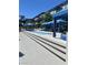 Inviting swimming pool area with blue cabanas, offering a relaxing outdoor retreat for residents at 8925 W Flamingo Rd # 105, Las Vegas, NV 89147