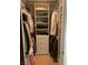 Organized walk-in closet featuring shelving and drawers for optimal storage solutions at 8925 W Flamingo Rd # 105, Las Vegas, NV 89147