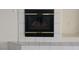 Close-up of the fireplace with a black frame at 8982 Emerald Waters Ct, Las Vegas, NV 89147