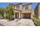 Inviting two-story home with covered parking and a cozy balcony at 9104 Pearl Cotton Ave, Las Vegas, NV 89149