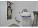 Water filtration system and water heater in utility room at 9104 Pearl Cotton Ave, Las Vegas, NV 89149
