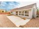 Low maintenance backyard showcasing a patio area and the home's exterior at 9514 Teton Vista Ave, Las Vegas, NV 89117