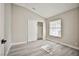 A bright bedroom with plank flooring, and neutral tones at 9514 Teton Vista Ave, Las Vegas, NV 89117