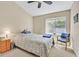 Comfortable bedroom with large window for natural light, and cozy interior at 9517 Mountainair Ave, Las Vegas, NV 89134