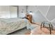 Cozy bedroom with natural light, and adjacent to a quaint desk and interior design at 9517 Mountainair Ave, Las Vegas, NV 89134