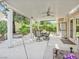 Covered patio with outdoor dining area and manicured landscaping at 9517 Mountainair Ave, Las Vegas, NV 89134