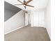 Carpeted bedroom with a modern ceiling fan and double closets at 7017 Pearl Hilltop Ct, Las Vegas, NV 89148