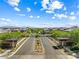 Elegant community entrance with manicured landscaping and clear signage at 7017 Pearl Hilltop Ct, Las Vegas, NV 89148