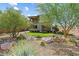 Inviting front yard showcasing desert landscaping and a modern home exterior at 7017 Pearl Hilltop Ct, Las Vegas, NV 89148