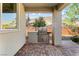 Cozy outdoor kitchen featuring stainless steel grill and brick flooring at 7017 Pearl Hilltop Ct, Las Vegas, NV 89148