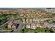 Expansive aerial view of a residential community with mature landscaping and well-maintained streets at 1013 Brinkman St, Las Vegas, NV 89138