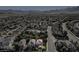 Wide aerial view of a suburban neighborhood showcasing the home's location and surrounding landscape at 1013 Brinkman St, Las Vegas, NV 89138