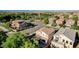 An aerial shot of a well-maintained home in a tranquil neighborhood with lush landscaping and mature trees at 1013 Brinkman St, Las Vegas, NV 89138