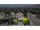 Aerial shot of the home shows a two-story house with well-manicured landscaping and a mountain view at 1013 Brinkman St, Las Vegas, NV 89138
