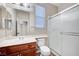 Bathroom with a walk-in shower and a vanity with ample counter space at 1013 Brinkman St, Las Vegas, NV 89138
