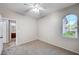 Cozy bedroom with natural light and carpeted floor at 1013 Brinkman St, Las Vegas, NV 89138