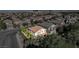View of stucco house in a well-manicured suburban community with a tile roof and mature landscaping on a sunny day at 1013 Brinkman St, Las Vegas, NV 89138