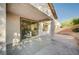 Covered patio with sliding glass doors and brick pavers, ideal for outdoor entertaining at 1013 Brinkman St, Las Vegas, NV 89138