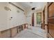 Bathroom with open plumbing and an adjacent window and door at 112 Quail Run Rd, Henderson, NV 89014