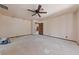 Bedroom featuring unfinished flooring, ample space, and potential for customization at 112 Quail Run Rd, Henderson, NV 89014