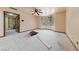 Spacious bedroom featuring a ceiling fan and a large window bay at 112 Quail Run Rd, Henderson, NV 89014