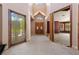 A bright entryway featuring high ceilings and a double door entry at 112 Quail Run Rd, Henderson, NV 89014