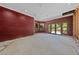 Spacious living room with large windows and exposed wall studs at 112 Quail Run Rd, Henderson, NV 89014