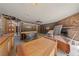 Open living room with fireplace and visible studs for renovation at 112 Quail Run Rd, Henderson, NV 89014