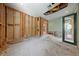 Room under renovation featuring exposed framing and recessed lighting at 112 Quail Run Rd, Henderson, NV 89014