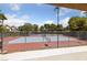 Community tennis court is fenced in and lit for playing day or night at 112 Quail Run Rd, Henderson, NV 89014