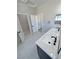 Beautiful bathroom featuring a double vanity with quartz countertop and a glass-enclosed shower at 1131 Lupin St, Pahrump, NV 89048