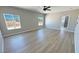 Spacious bedroom with wood flooring, and natural light at 1131 Lupin St, Pahrump, NV 89048