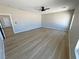 Expansive bedroom with wood-style flooring at 1131 Lupin St, Pahrump, NV 89048