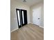 Bright entryway with stylish flooring and a modern front door at 1131 Lupin St, Pahrump, NV 89048