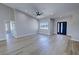 Bright living room with hardwood floors, vaulted ceiling, recessed lights and a double-door entry at 1131 Lupin St, Pahrump, NV 89048