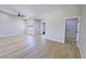 Spacious living room featuring hardwood floors, a window, and neutral paint colors at 1131 Lupin St, Pahrump, NV 89048