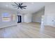Inviting living room boasting hardwood floors, vaulted ceilings, double-door entry, and plenty of natural light at 1131 Lupin St, Pahrump, NV 89048