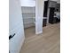 Kitchen featuring a walk-in pantry and ample storage space at 1131 Lupin St, Pahrump, NV 89048