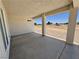 Covered patio with concrete floor and square columns, offering an outdoor living space and unobstructed views at 1131 Lupin St, Pahrump, NV 89048