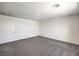 Spacious bedroom with soft carpet and a bright neutral color palette at 1301 Miller Springs Ln # Lot 93, North Las Vegas, NV 89084