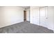 Bedroom features modern carpet and double-door closet at 1301 Miller Springs Ln # Lot 93, North Las Vegas, NV 89084