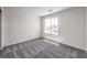 Bedroom featuring soft modern carpeting and a bright window at 1301 Miller Springs Ln # Lot 93, North Las Vegas, NV 89084