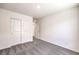 Bright bedroom with neutral walls, closet with sliding doors, and carpet at 1301 Miller Springs Ln # Lot 93, North Las Vegas, NV 89084