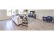 Bright living room featuring tile flooring, a comfortable sofa, stylish furnishings, and lots of natural light at 1301 Miller Springs Ln # Lot 93, North Las Vegas, NV 89084