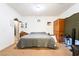 Functional bedroom featuring a bed and dresser at 135 Manor House Ave, Las Vegas, NV 89123